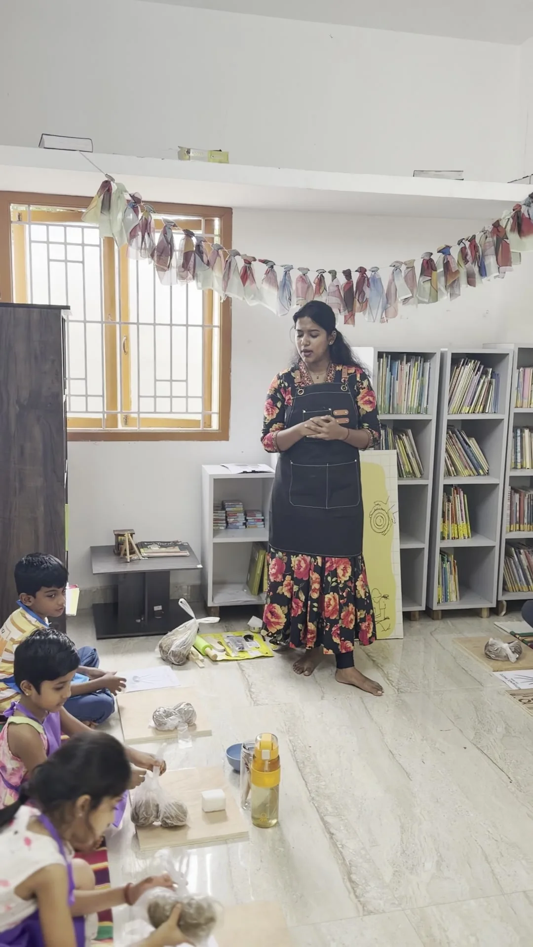 Logisa teaching pottery to students in the Coimbatore studio